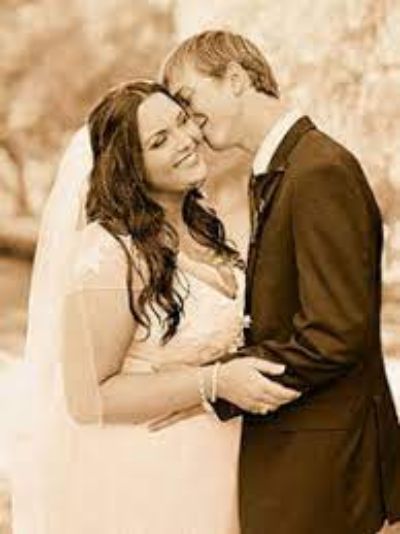 Cassandra Jade Estevez wearing a white gown in her wedding ceremony.